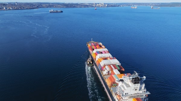 Aerial view of container ship on the water